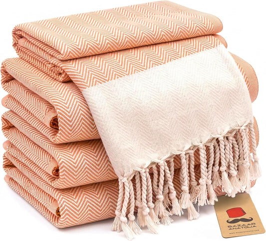 Set of four orange herringbone Turkish cotton hand towels