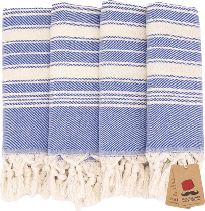 Set of four royal blue Stripe Turkish cotton hand towels with tasseled ends.