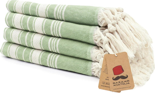 Set of four green Stripe Turkish cotton hand towels with tasseled ends.