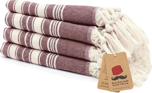 Set of four maroon Stripe Turkish cotton hand towels with tasseled ends.
