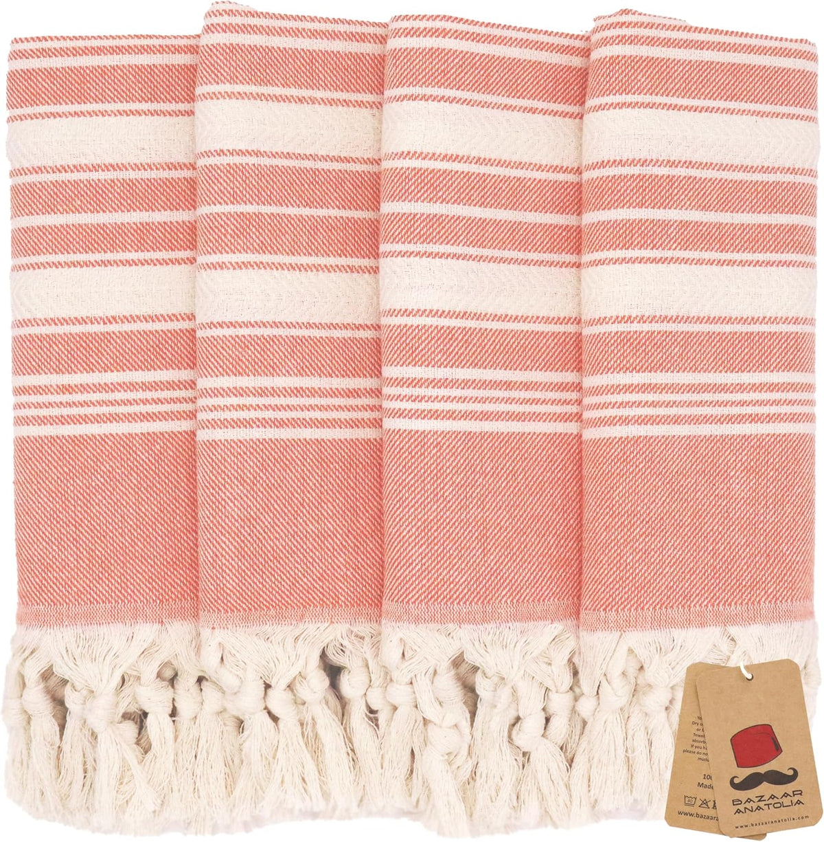 Set of four orange Stripe Turkish cotton hand towels with tasseled ends.