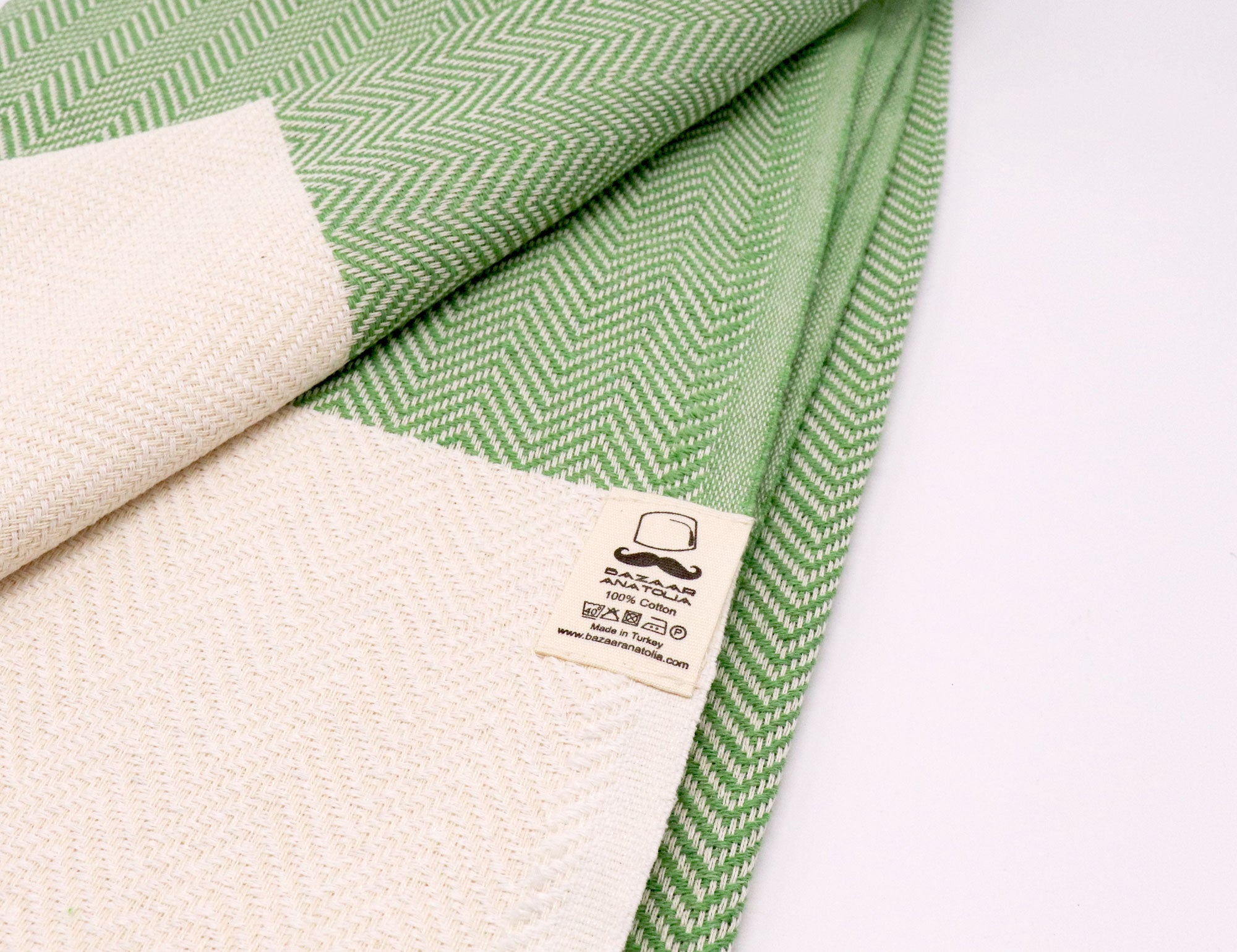https://bazaaranatolia.com/cdn/shop/products/Herringbone-Turkish-Towel-green-4.jpg?v=1569050645